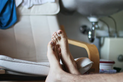 Home. Crossed Feet